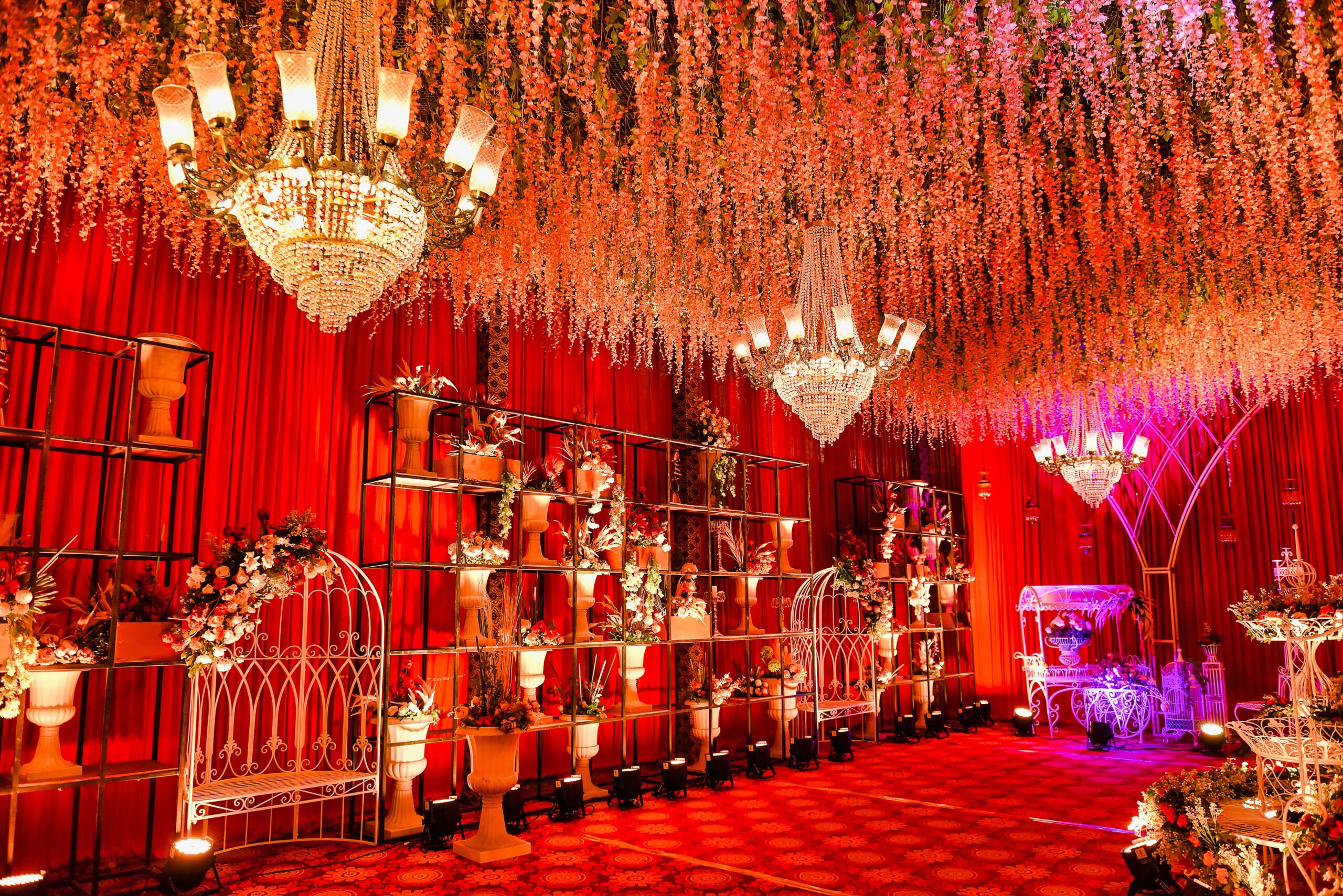 A beautiful Indian wedding setup with stage decorations and flowers